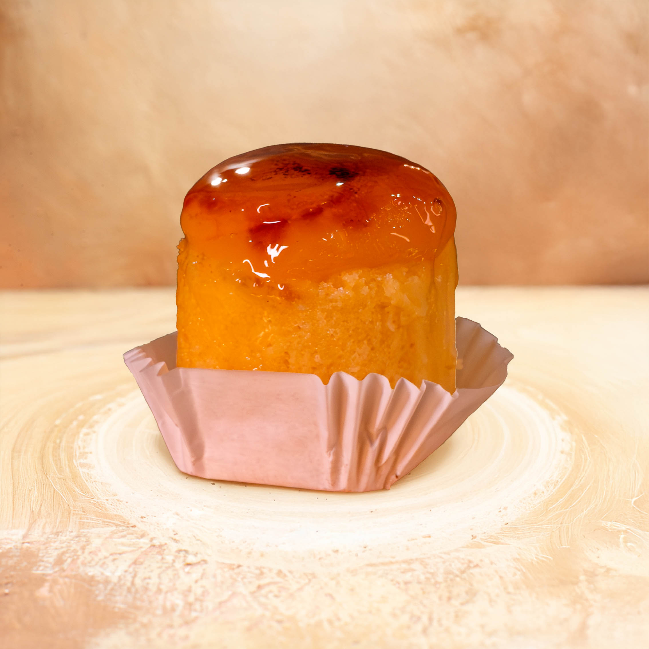 Vertical view of freshly baked soft cake with fruits on mixed color background